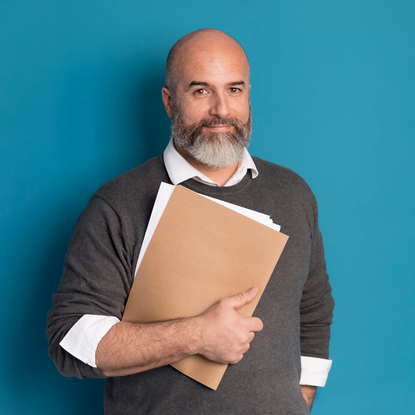 portrait-bearded-man-holding-documents